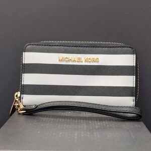 Michael Kors Black/White Striped All-around Zippered Wristlet/Wallet.